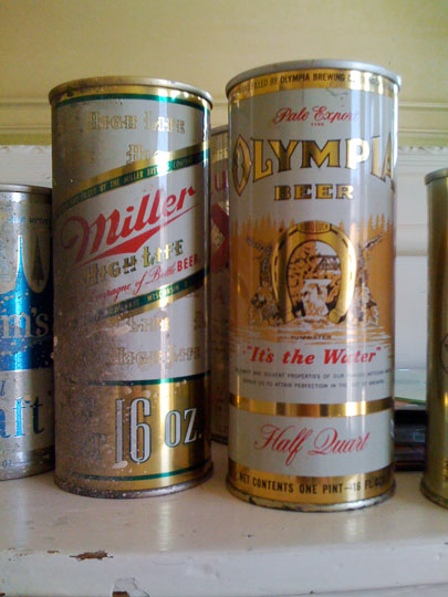 Vintage tall boy Miller High Life and Olympia Beer Cans